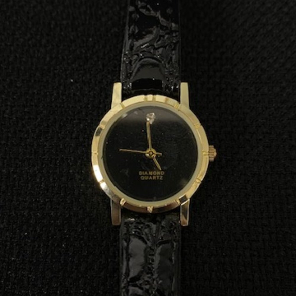 Genuine Diamond Black and Gold Quartz Women's Watch